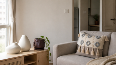 Small rented 1BHK living room with compact Mapland vases, face planter and textured cushion