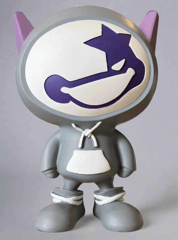 Gray astronaut figurine with purple star design