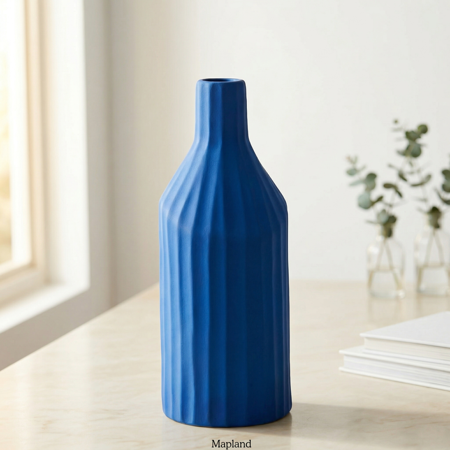 Faceted bottle ceramic vase in cobalt blue — handmade ceramic vase | Mapland Design Studio