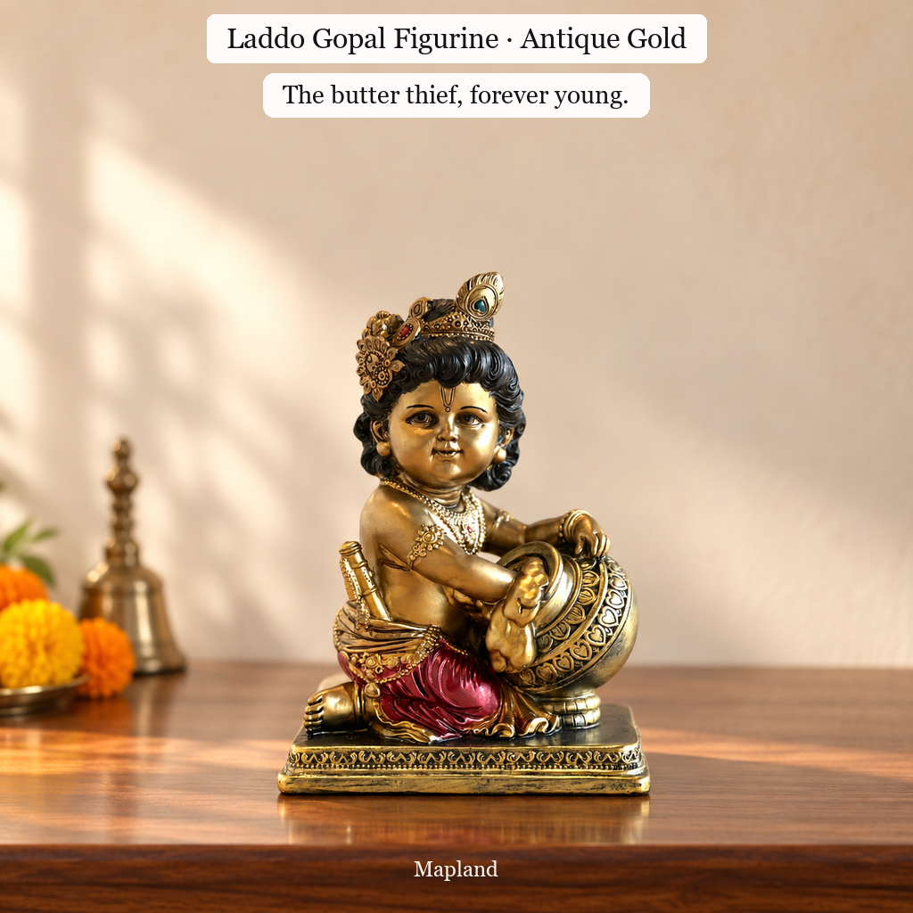 Laddo Gopal antique gold figurine on a wooden console | Mapland
