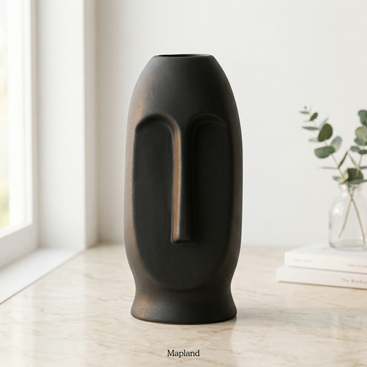 Large Moai face ceramic vase in charcoal black — handmade ceramic vase | Mapland Design Studio