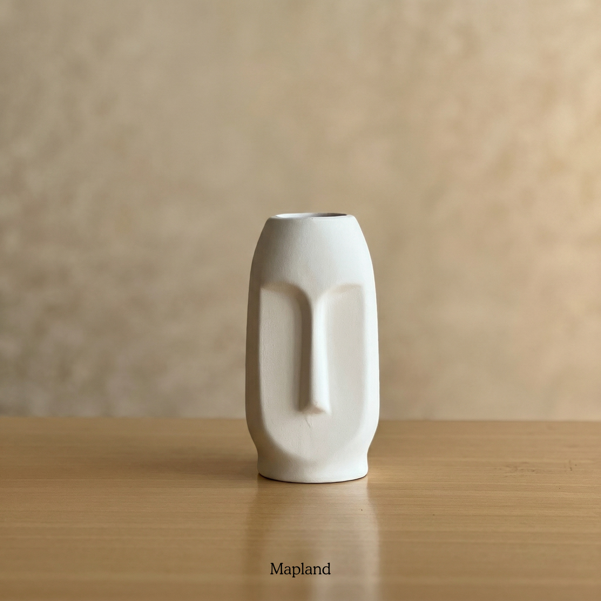 Moai face ceramic vase in chalk white — handmade ceramic vase | Mapland Design Studio