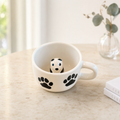 Peekaboo Panda ceramic cup with paw print pattern | Mapland