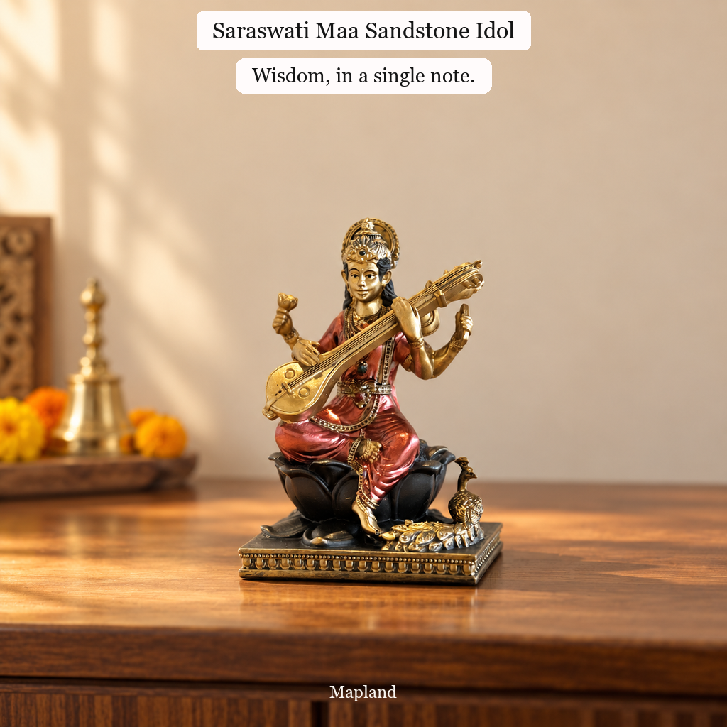 Saraswati Maa sandstone idol on a wooden console | Mapland