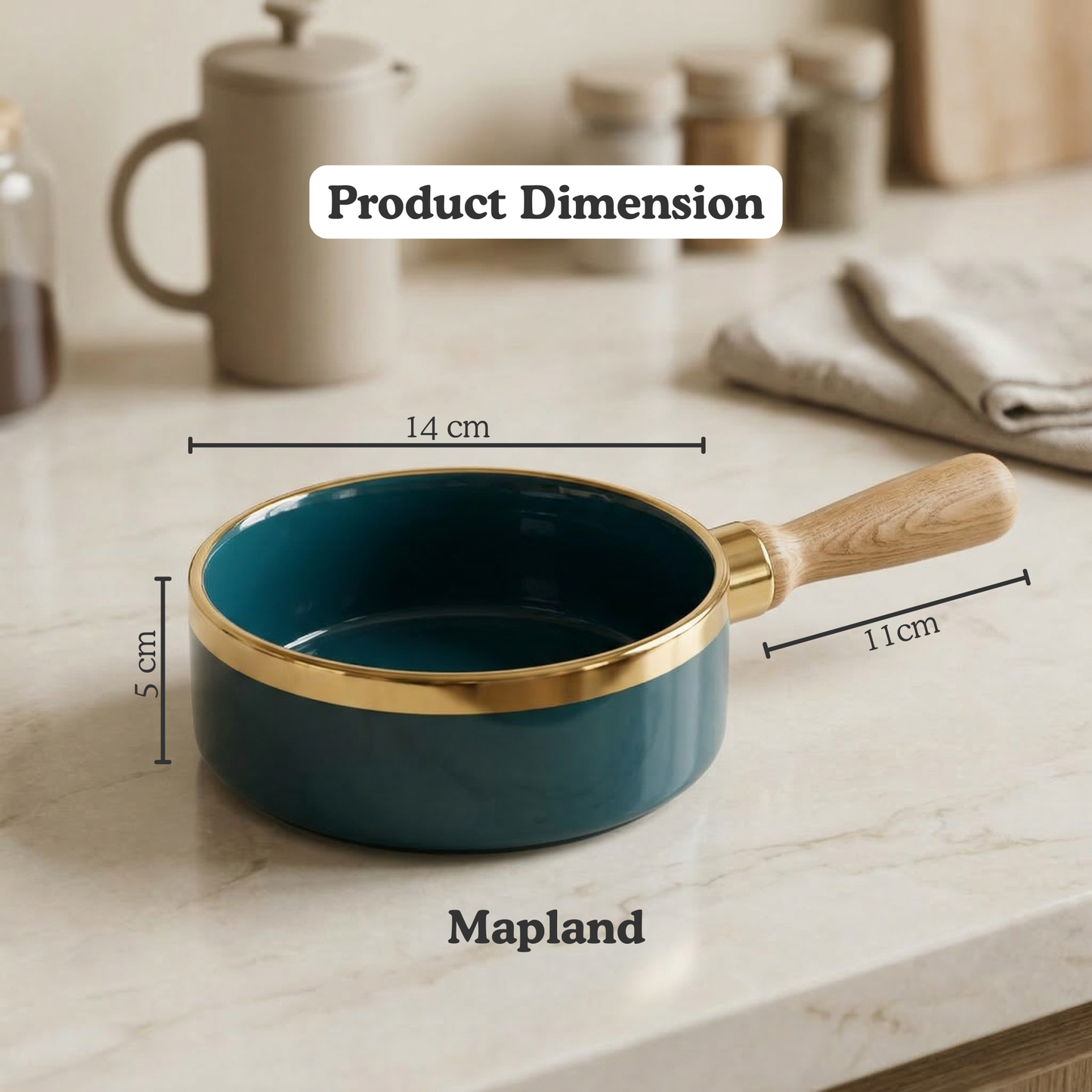 Teal pan with gold rim and wooden handle on a marble surface, labeled with dimensions and brand 'Mapland'.
